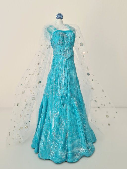 La robe sous cloche d'Elsa inclus dans le thème